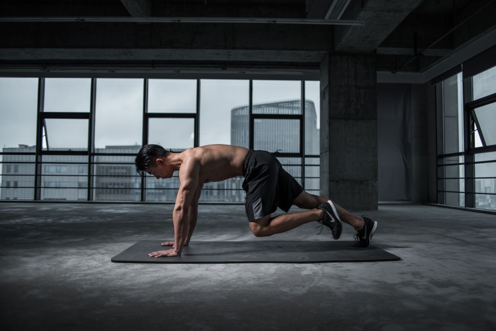 Athlete finishing a focused session in a spacious architectural training room